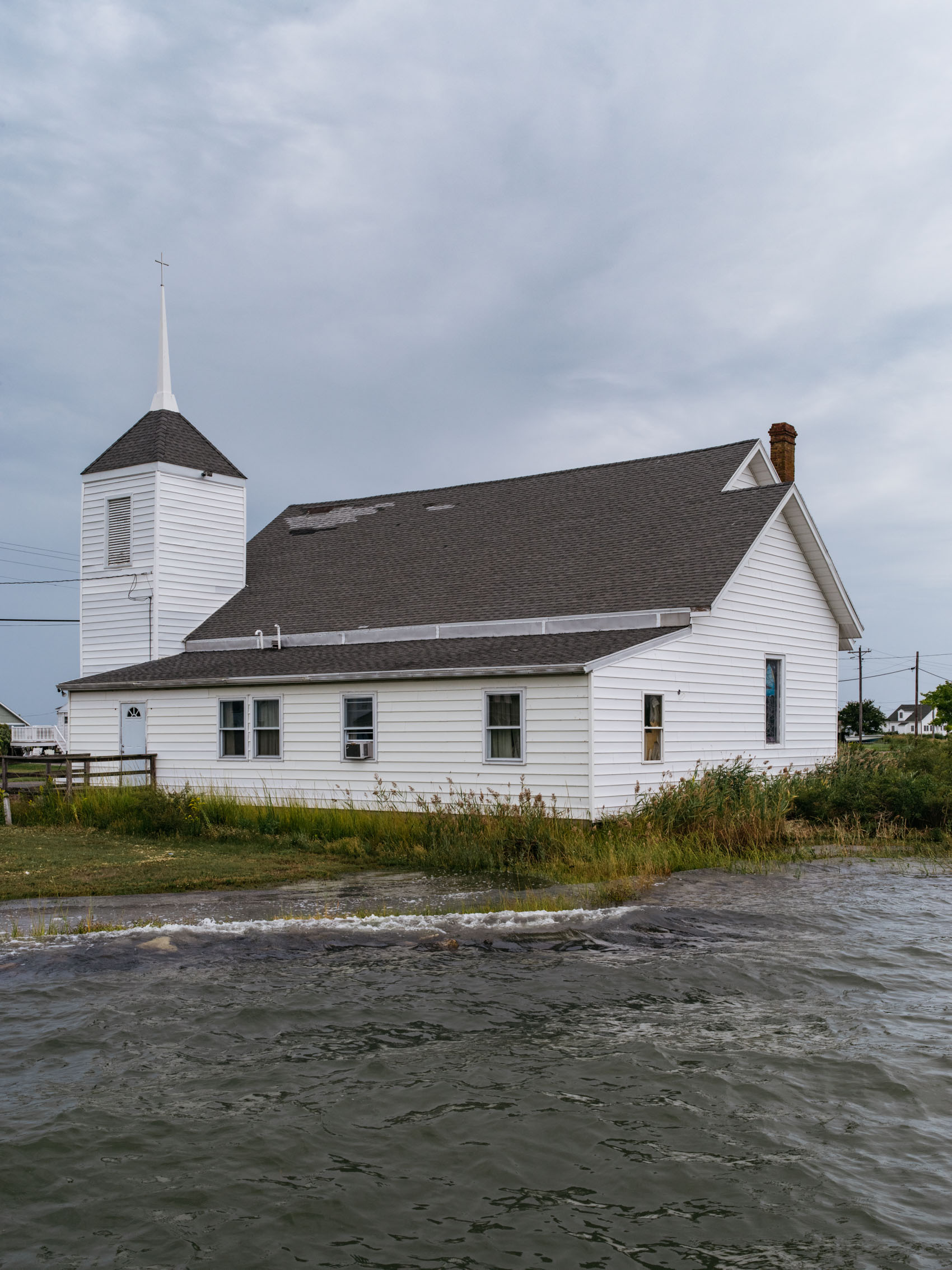 church with sea level rise issues water up to back door