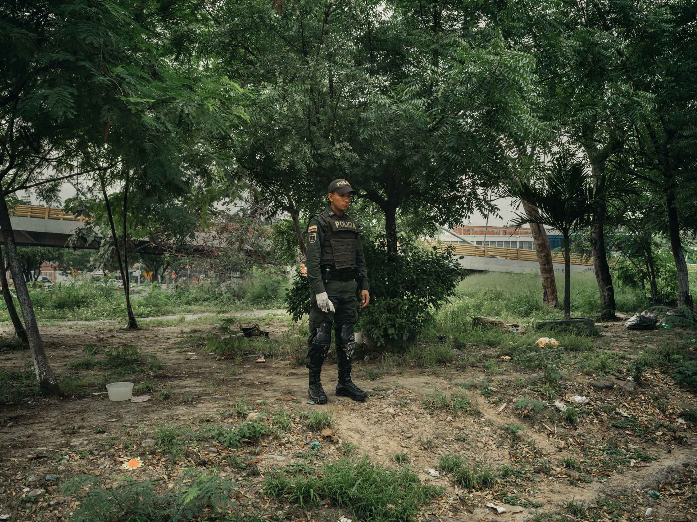 police stand guard during a raid