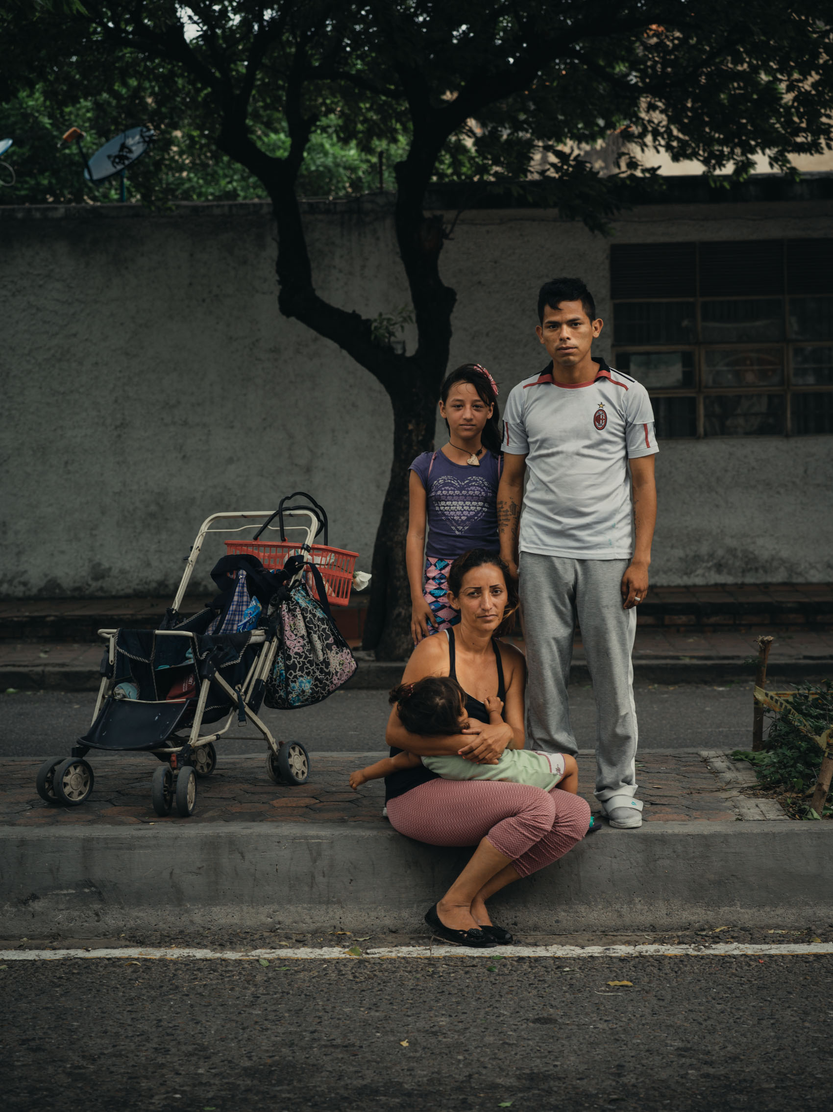 portrait of homeless family from Venezuela