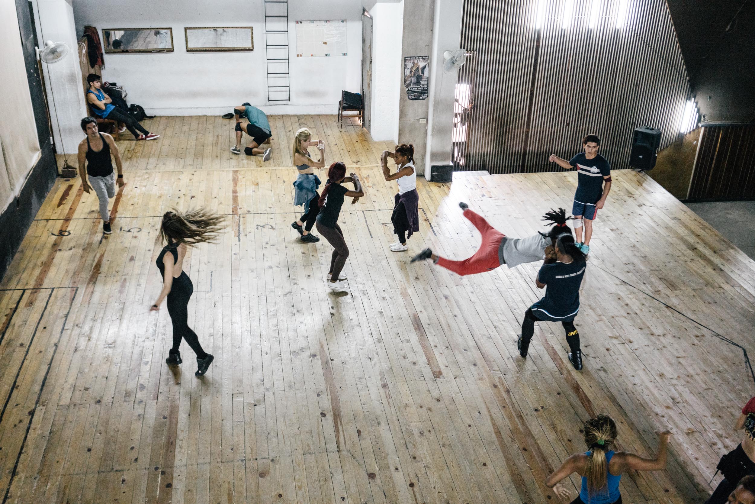 Dancers practicing routine in theater in Havana