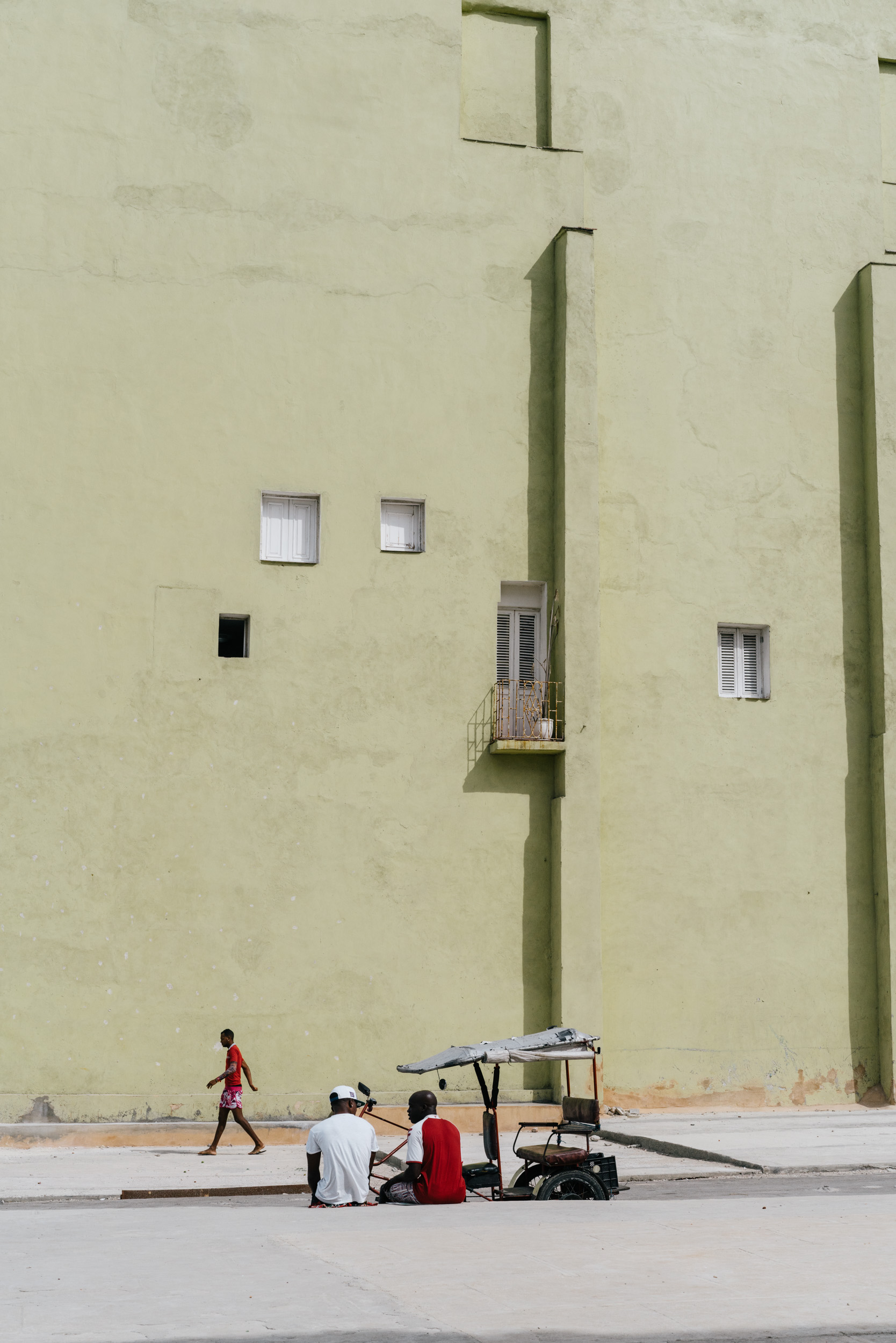 yellow building in havana along the malecón