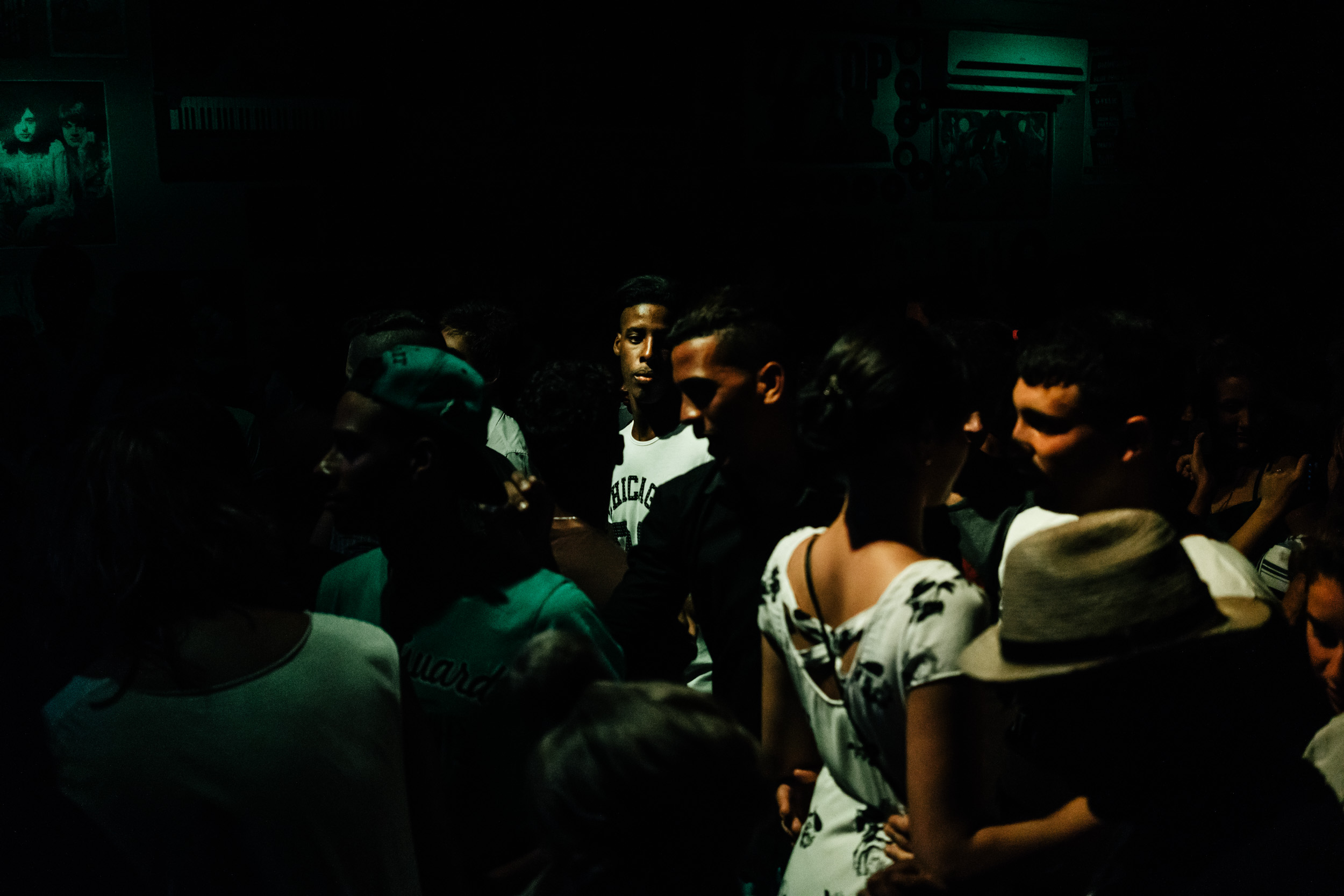 cubans at night club in Havana dark